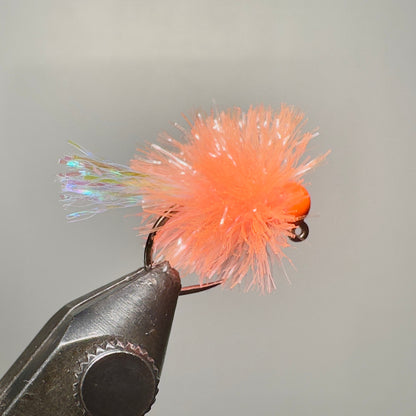 Coral with orange tungsten bead